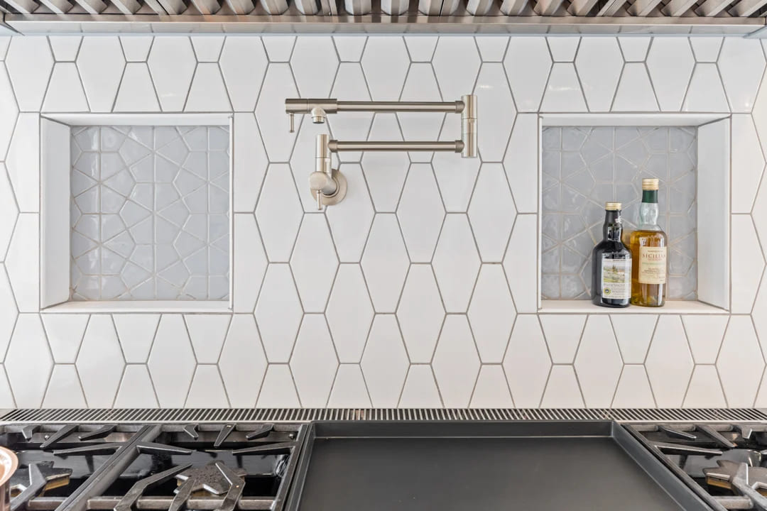 Lebanon kitchen remodel showing detailed speciality tile backsplash behind built-in range